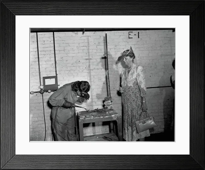 Framed Print : Eleanor Roosevelt Watches a Welding Student Framed Print : Eleanor Roosevelt Watches a Welding Student