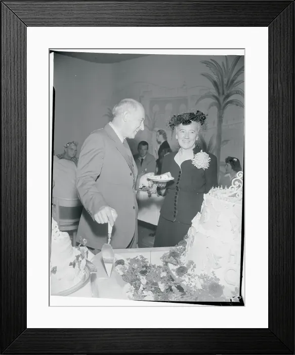 Framed Print : Cecil B. DeMille and Wife Celebrating With Birthday Cake Framed Print : Cecil B. DeMille and Wife Celebrating With Birthday Cake