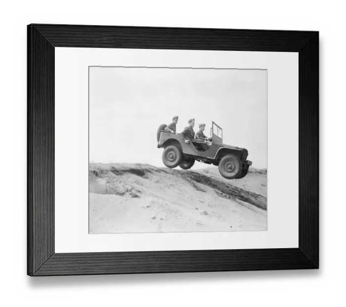 Framed Print : Military Personnel Driving Jeep down Dunes Framed Print : Military Personnel Driving Jeep down Dunes