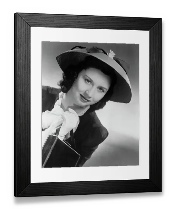 Framed Print : Actress Dorothy Kilgallen Posing in Hat and Holding Purse Framed Print : Actress Dorothy Kilgallen Posing in Hat and Holding Purse