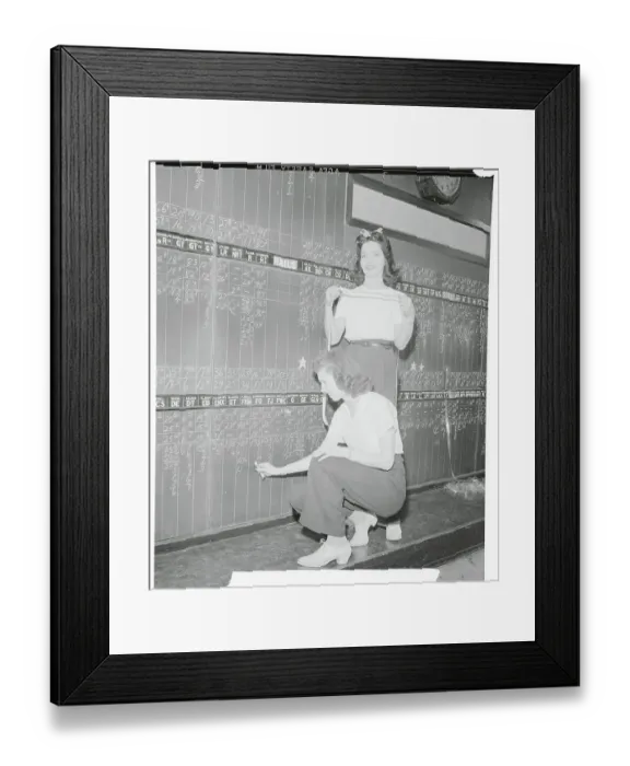 Framed Print : Women Updating a Stock Board Framed Print : Women Updating a Stock Board