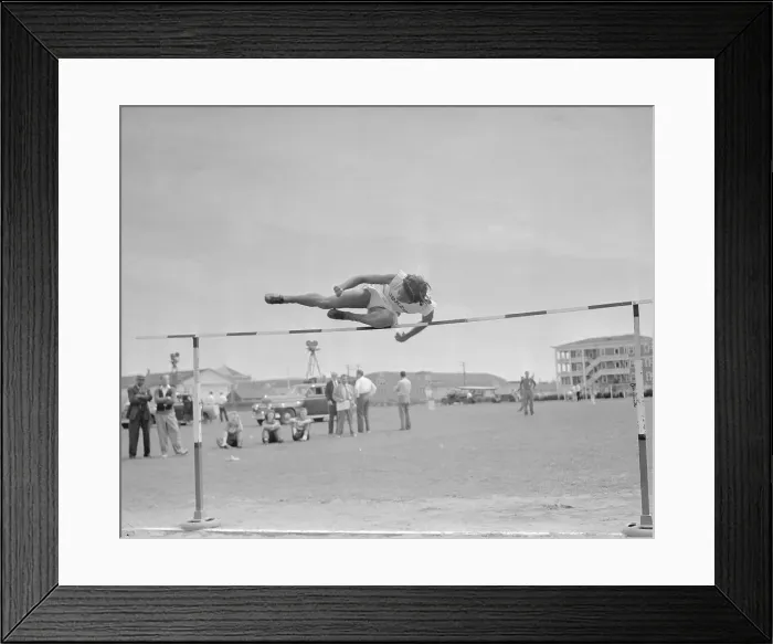 Framed Print : Alice Coachman up and over High Jump Bar