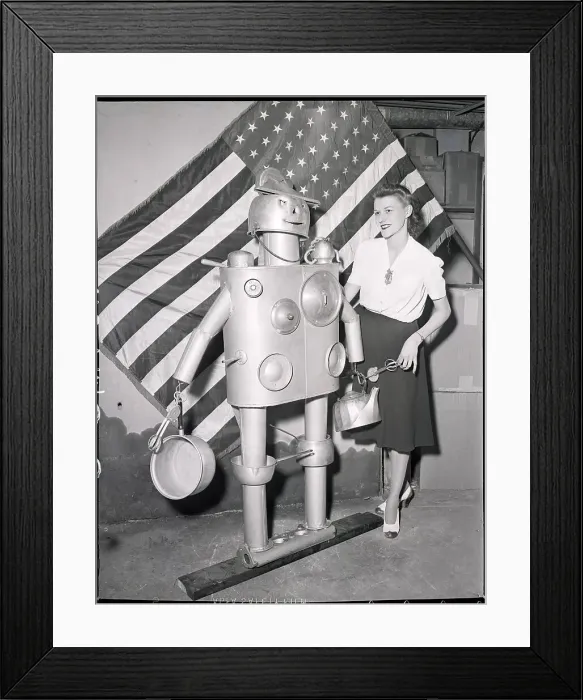 Framed Print : Aluminum Robot Made Of Pots And Pans Framed Print : Aluminum Robot Made Of Pots And Pans