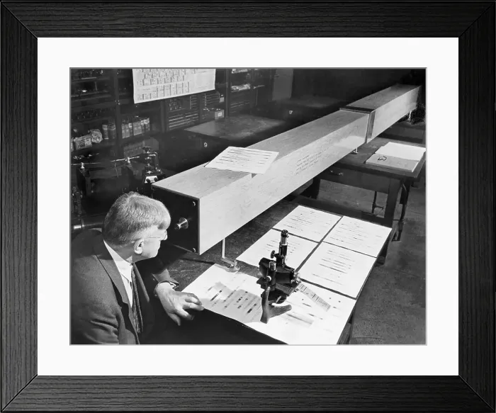 Framed Print : Man Looking Into Eye Piece Of Long Box Framed Print : Man Looking Into Eye Piece Of Long Box