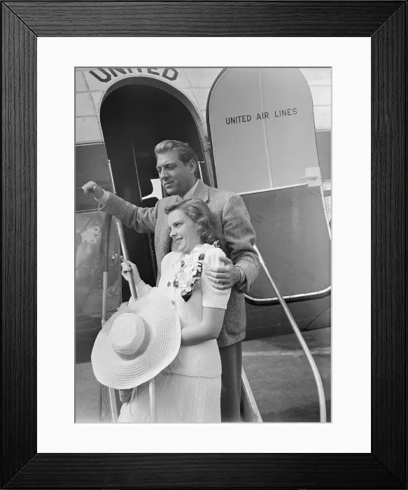 Framed Print : Judy Garland and New Husband Dave Rose Leaving Aircraft Framed Print : Judy Garland and New Husband Dave Rose Leaving Aircraft