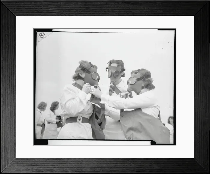 Framed Print : Three Female Army Nurses Adjusting Their Gas Masks