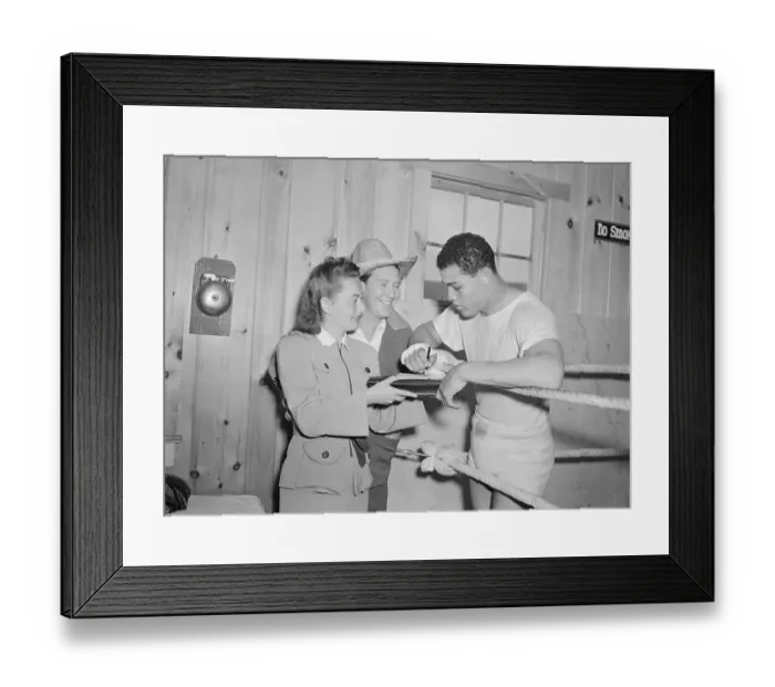 Framed Print : Joe Louis Signing Autograph for Olivia De Havilland Framed Print : Joe Louis Signing Autograph for Olivia De Havilland