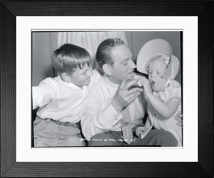 Framed Print : Actor Melvyn Douglas with Son and Daughter Framed Print : Actor Melvyn Douglas with Son and Daughter