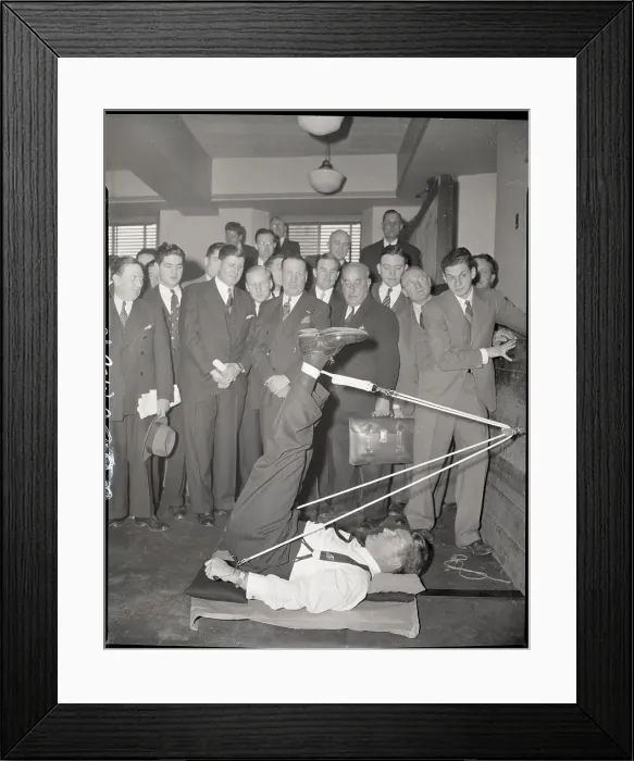 Framed Print : Gene Tunney Demonstrates Pulley Exercise Framed Print : Gene Tunney Demonstrates Pulley Exercise