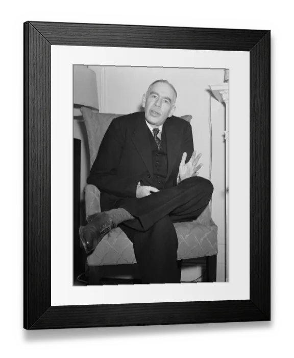Framed Print : John Maynard Keynes Sitting in Armchair Framed Print : John Maynard Keynes Sitting in Armchair