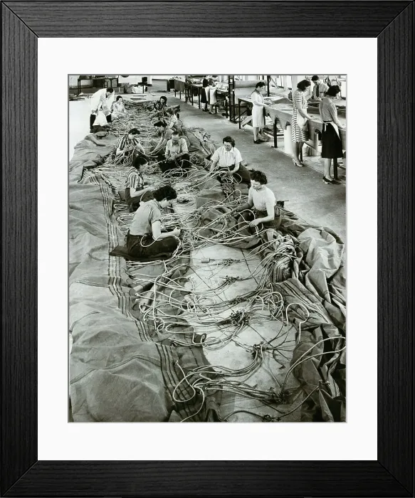 Framed Print : Women Working Amongst Snake-Like Wires Framed Print : Women Working Amongst Snake-Like Wires
