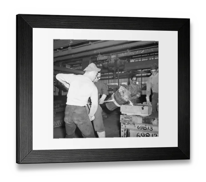 Framed Print : Workmen Pouring Molten Metal Into Mold Framed Print : Workmen Pouring Molten Metal Into Mold
