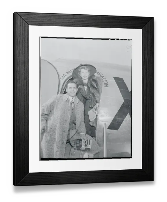Framed Print : Actress Lucille Ball and Desi Arnaz Standing at Airplane Entrance