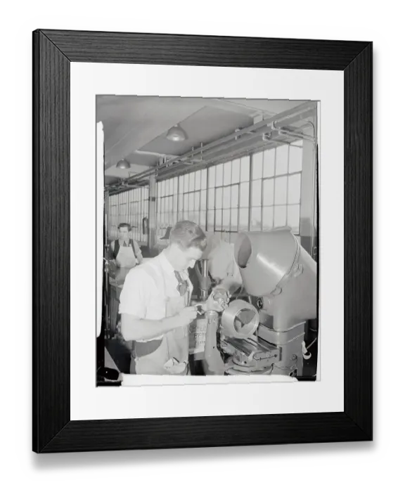 Framed Print : Ford Employee Examining Machinery Framed Print : Ford Employee Examining Machinery