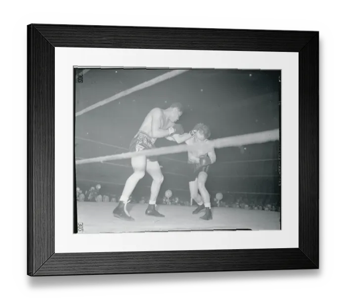 Framed Print : Joe Louis Boxing Against Clarence Burman Framed Print : Joe Louis Boxing Against Clarence Burman