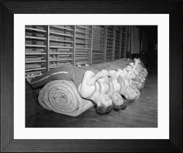 Framed Print : Students Doing Abdominal Excercises on Rolled Mat Framed Print : Students Doing Abdominal Excercises on Rolled Mat