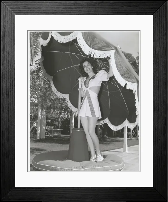 Framed Print : Joan Crawford Posing Under Large Umbrella Framed Print : Joan Crawford Posing Under Large Umbrella