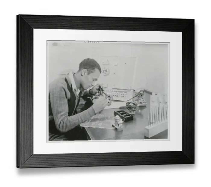 Framed Print : Young Man Working with Technical Device Framed Print : Young Man Working with Technical Device