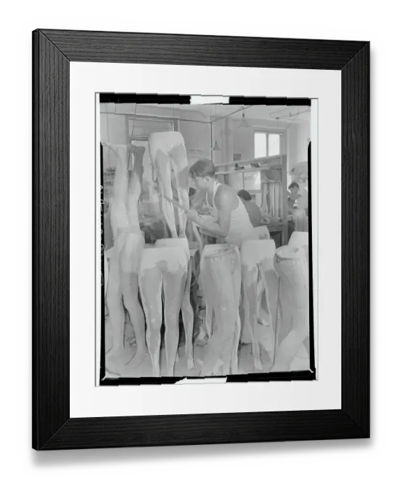Framed Print : Workman Filing Mannequin Legs Framed Print : Workman Filing Mannequin Legs