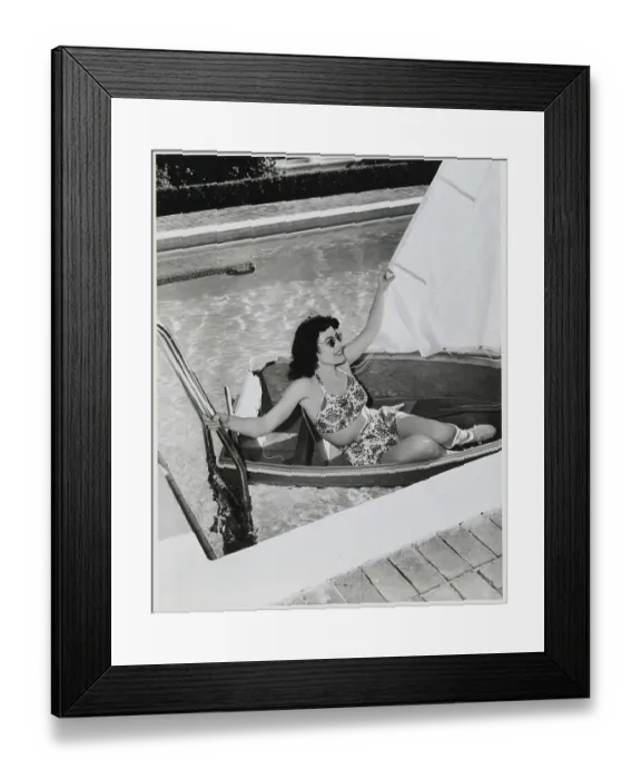 Framed Print : Joan Crawford Sitting in Sailboat Framed Print : Joan Crawford Sitting in Sailboat