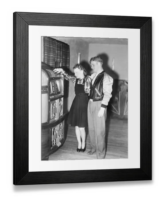 Framed Print : Couple Standing In Front Of Jukebox
