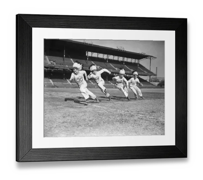 Framed Print : Football Players Running in Headdresses Framed Print : Football Players Running in Headdresses