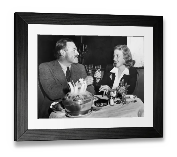Framed Print : Ernest Hemingway and Martha Gelhorn Make a Toast Framed Print : Ernest Hemingway and Martha Gelhorn Make a Toast