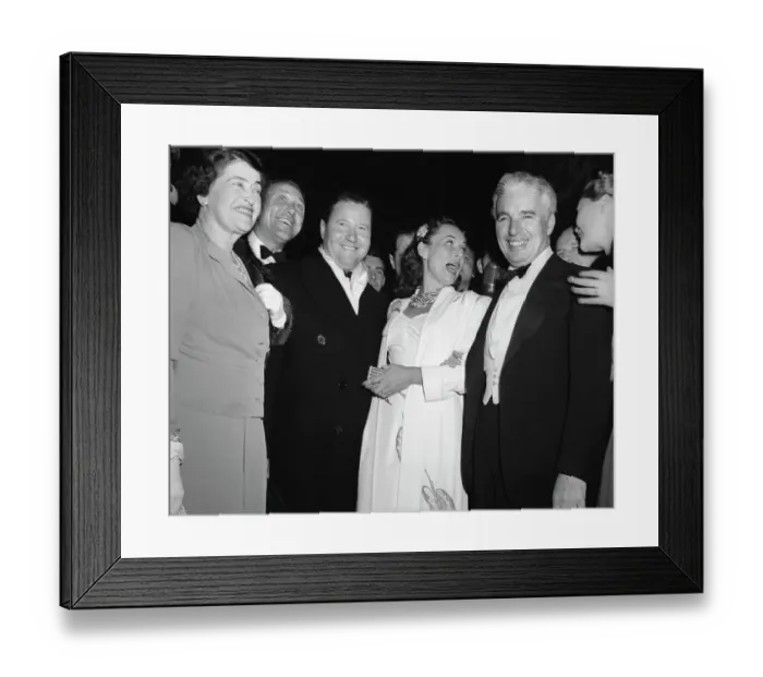 Framed Print : Charlie Chaplin Posing with Colleagues Framed Print : Charlie Chaplin Posing with Colleagues