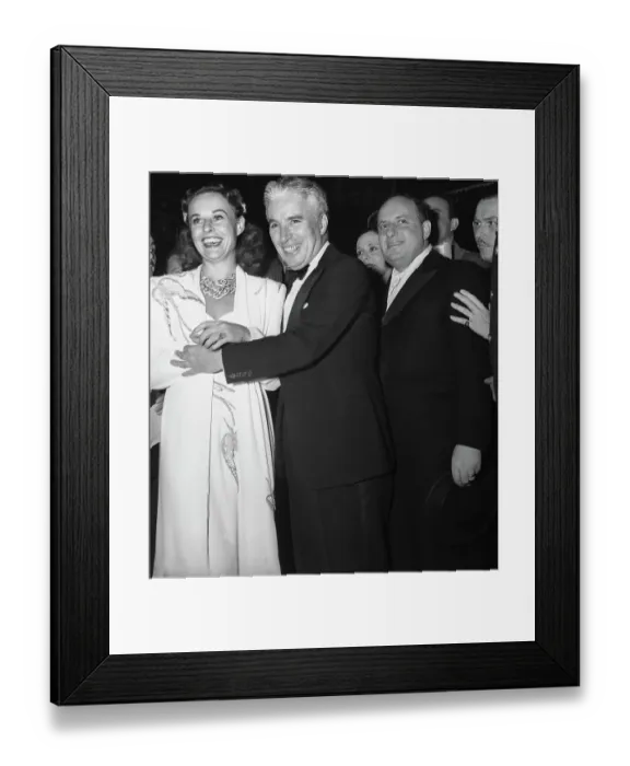 Framed Print : Charlie Chaplin Embracing Paulette Goddard Framed Print : Charlie Chaplin Embracing Paulette Goddard