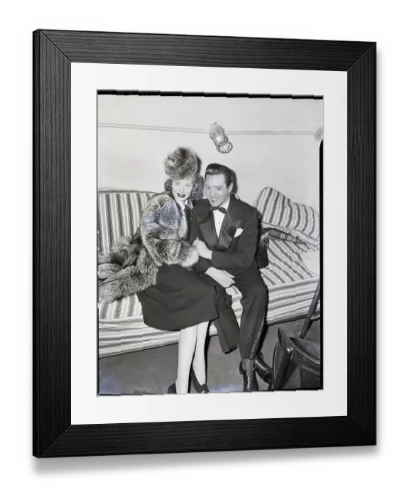 Framed Print : Lucille Ball Holds Desi Arnaz Framed Print : Lucille Ball Holds Desi Arnaz