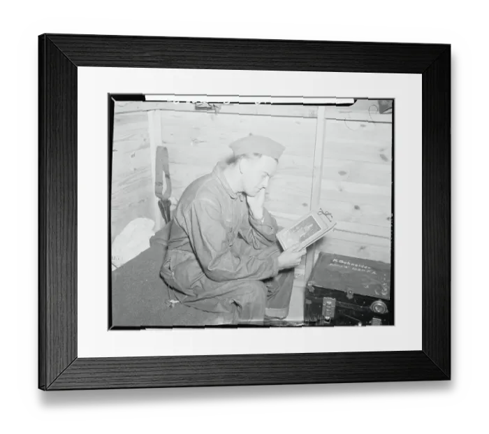 Framed Print : Eddie Fromm Looking at Photograph
