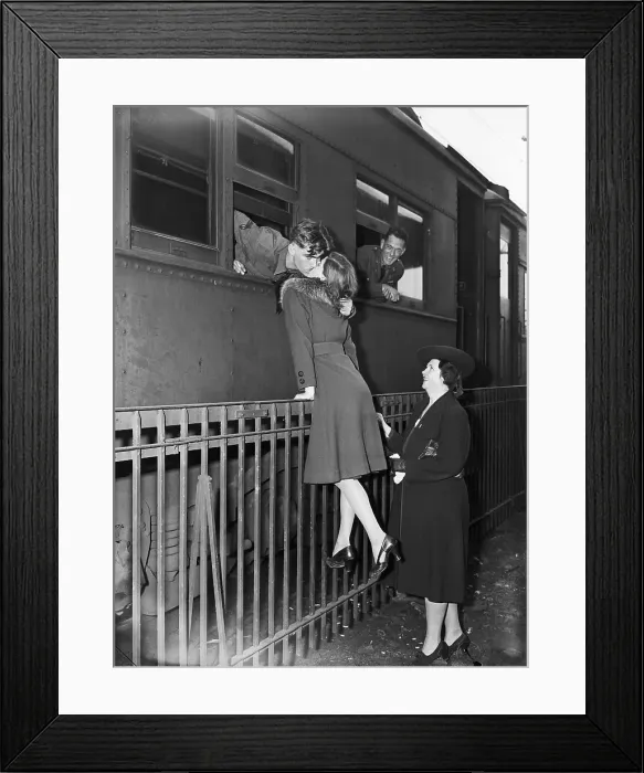 Framed Print : Soldier Kissing Girlfriend Goodbye