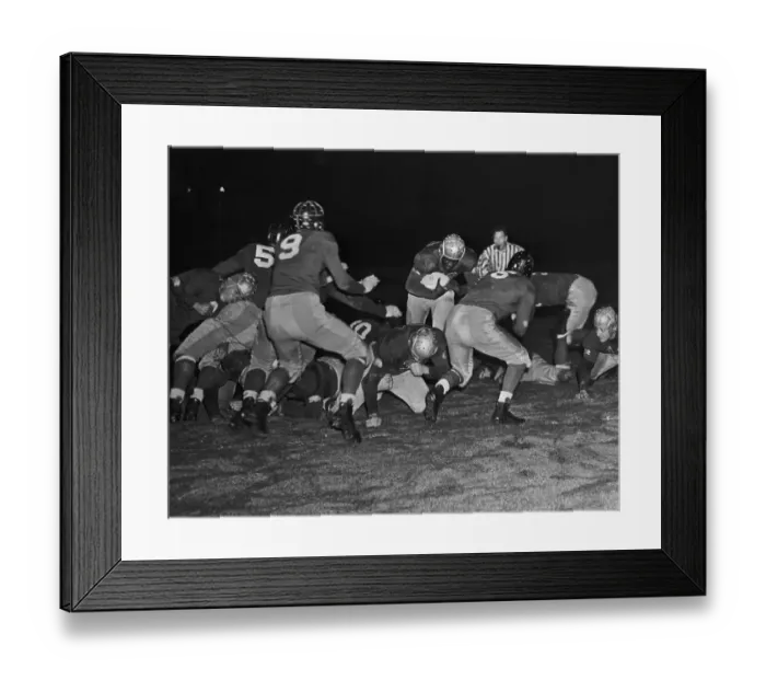 Framed Print : Jackie Robinson Running with Football