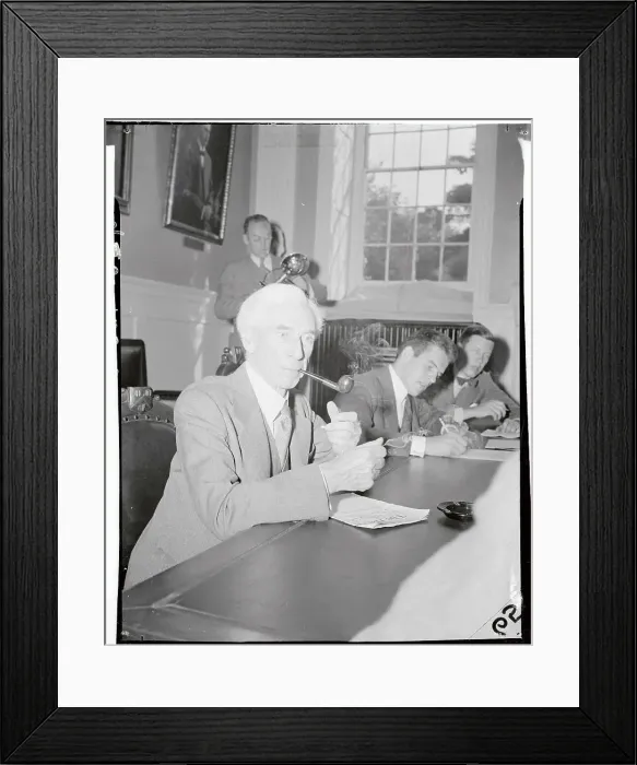 Framed Print : Bertrand Russell Smoking a Pipe at Conference Table