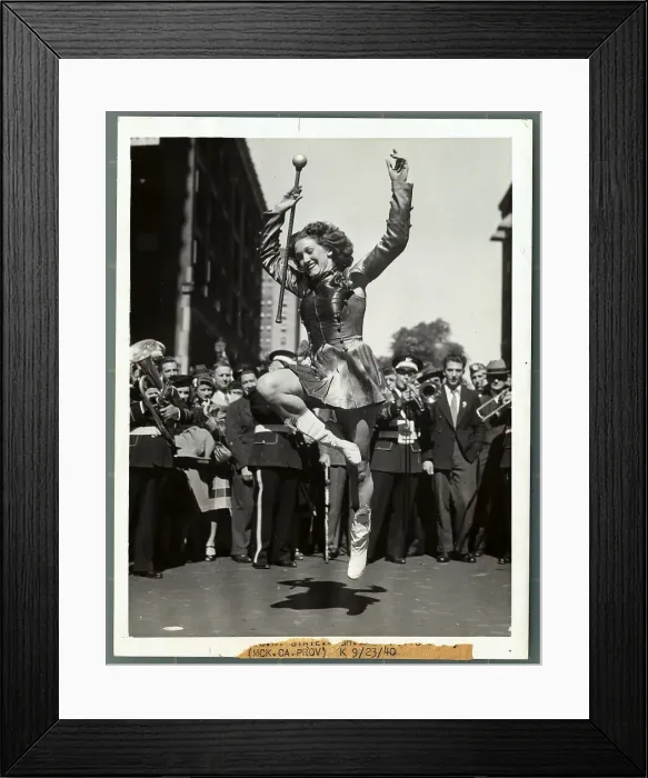 Framed Print : Drum Majorette Leaping in Air Framed Print : Drum Majorette Leaping in Air