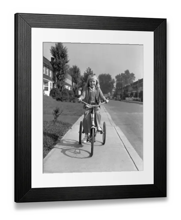 Framed Print : Girl on a Tricycle Framed Print : Girl on a Tricycle
