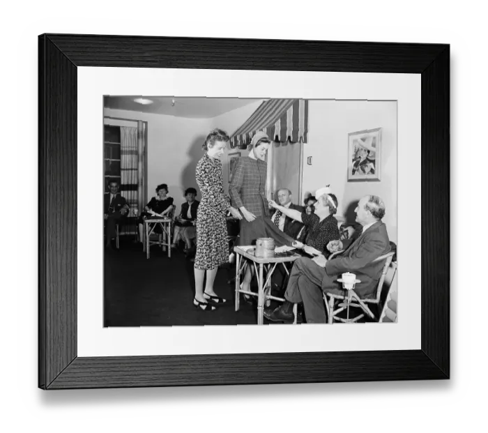 Framed Print : Designer Looking At Finished Outfit Framed Print : Designer Looking At Finished Outfit