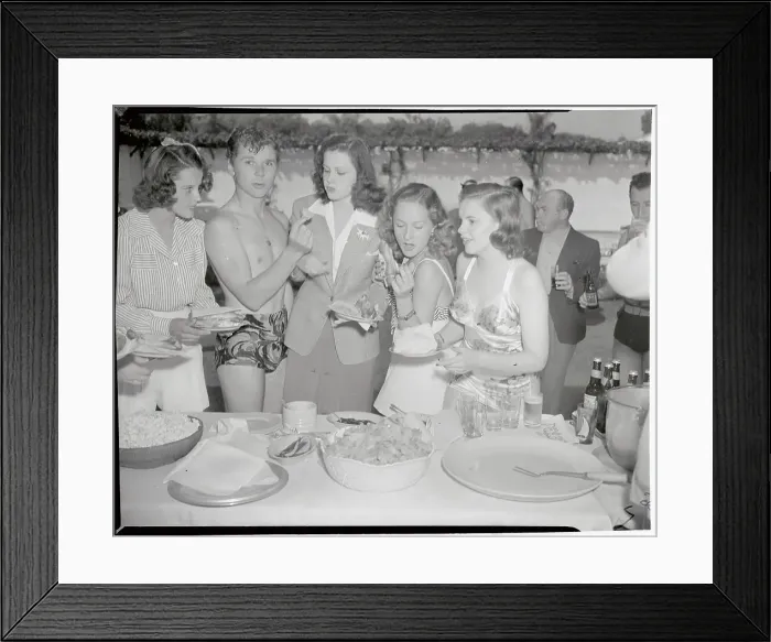 Framed Print : Judy Garland and Friends Standing at Banquet Table Framed Print : Judy Garland and Friends Standing at Banquet Table