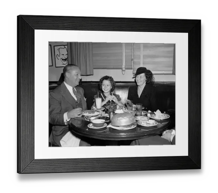 Framed Print : Shirley Temple and Her Parents at Dinner Table Framed Print : Shirley Temple and Her Parents at Dinner Table