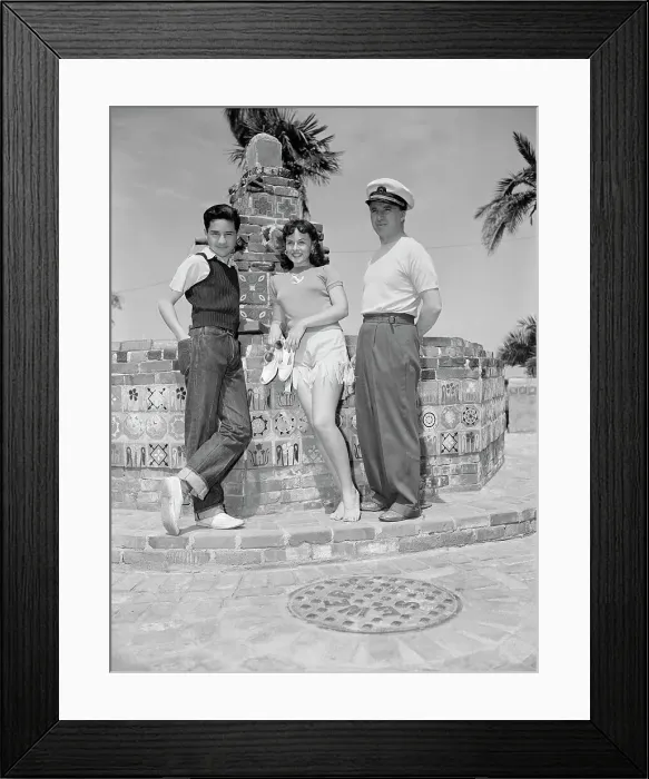 Framed Print : Charlie Chaplin Jr. and Sr. with Paulette Goddard Framed Print : Charlie Chaplin Jr. and Sr. with Paulette Goddard