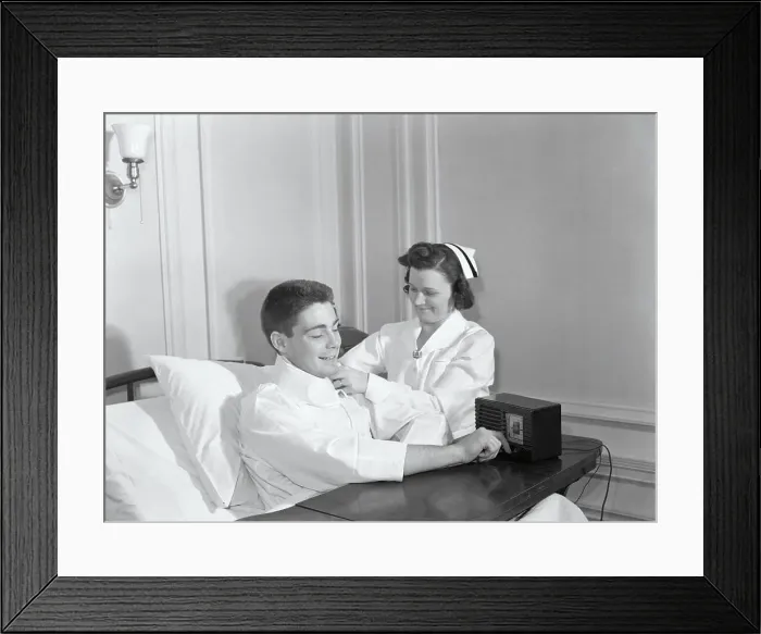 Framed Print : Nurse Prepping Hospitalized Man with a Radio Framed Print : Nurse Prepping Hospitalized Man with a Radio