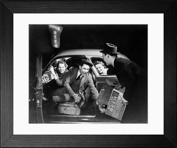 Framed Print : Drunken Driver Loading Beer in Car Framed Print : Drunken Driver Loading Beer in Car