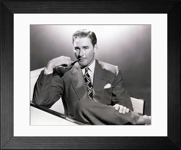 Framed Print : Errol Flynn Smoking a Pipe Framed Print : Errol Flynn Smoking a Pipe