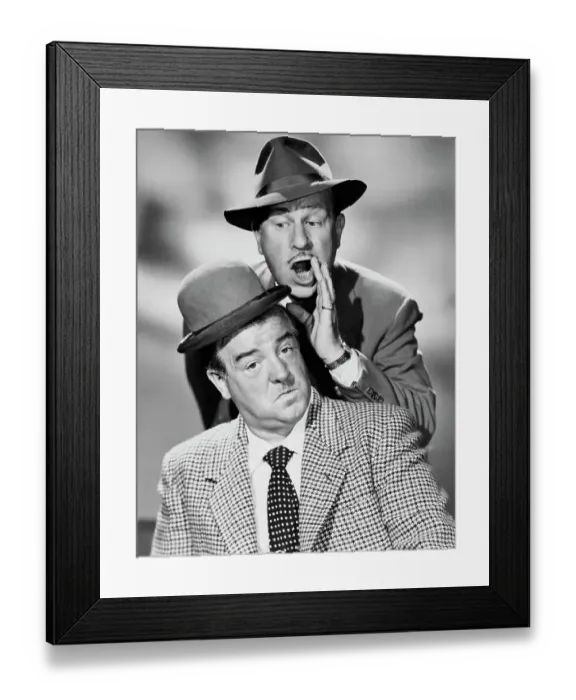 Framed Print : Comedian Bud Abbott Whispering to Lou Costello