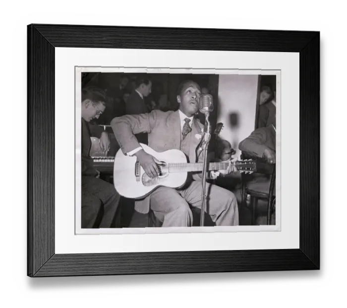 Framed Print : Blues Singer Josh White Strumming Guitar Framed Print : Blues Singer Josh White Strumming Guitar