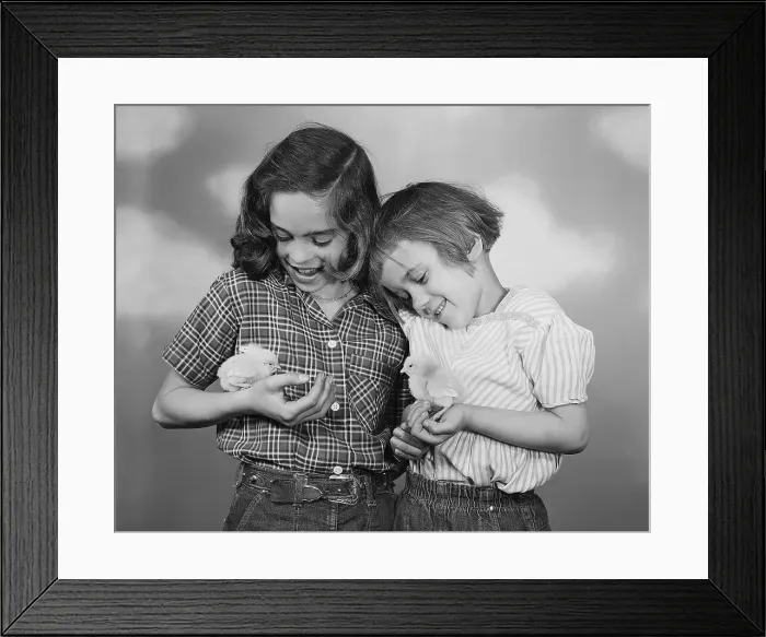 Framed Print : Two Girls Holding Baby Chicks Framed Print : Two Girls Holding Baby Chicks
