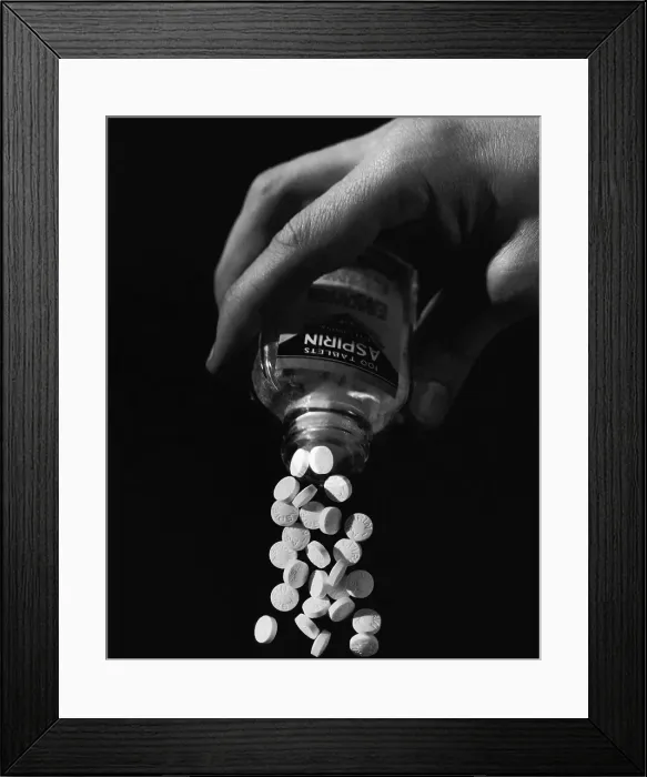 Framed Print : Hand Pouring Aspirin from Bottle Framed Print : Hand Pouring Aspirin from Bottle