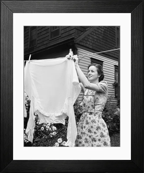 Framed Print : Woman Hanging Laundry Out to Dry Framed Print : Woman Hanging Laundry Out to Dry