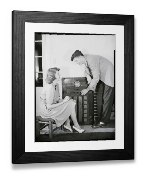 Framed Print : Young Couple at the Radio Framed Print : Young Couple at the Radio