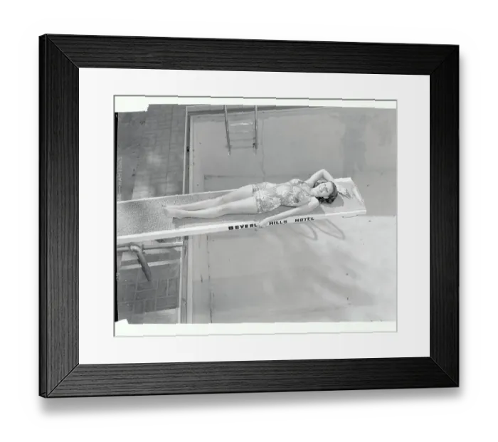Framed Print : Actress Rita Hayworth Sunning Herself on Diving Board Framed Print : Actress Rita Hayworth Sunning Herself on Diving Board